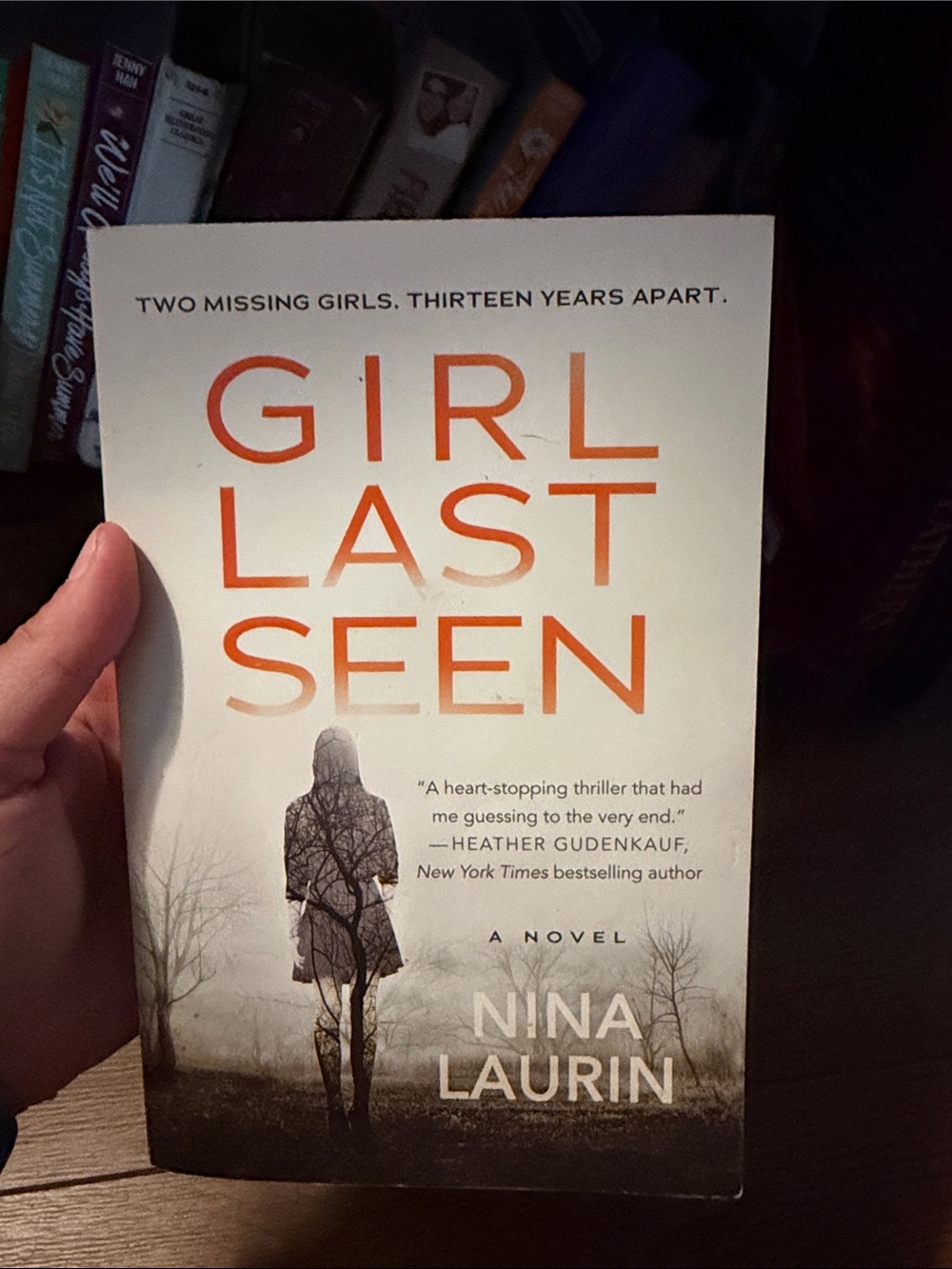 Girl Last Seen by Nina Laurin - White & Orange Paperback Thriller